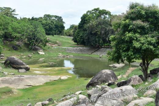 The wall of the pond still has the original stones