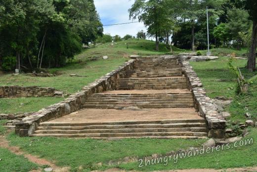 Long wide staircase in the middle of the site, starts at the pond and goes up to Zone 2